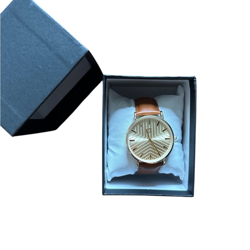 PX men’s watch, in cognac color NIB.